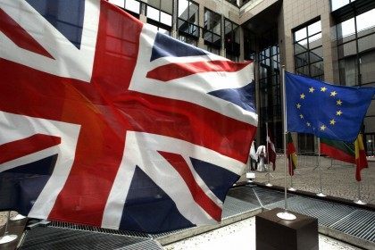 A European Flag and the Union Jack hang