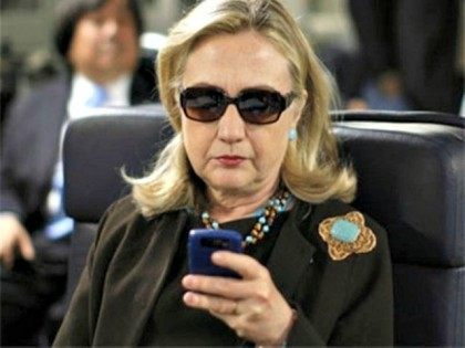 Hillary on her Phone AP Photo