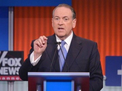 Former Arkansas governor Mike Huckabee speaks during the prime time Republican presidential debate on August 6, 2015 at the Quicken Loans Arena in Cleveland, Ohio. AFP PHOTO/MANDEL NGAN (Photo credit should read MANDEL NGAN/AFP/Getty Images)