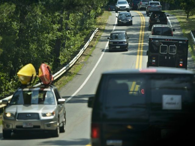 US President Barack Obama's motorcade makes is way along island roads to the beach Au