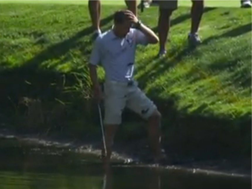 Watch Pro Golfer Peter Malnati Tries to Hit Ball Out of Pond, Ends Up