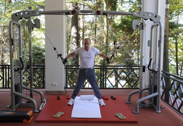 Russian President Putin exercises in a gym at the Bocharov Ruchei state residence in Sochi