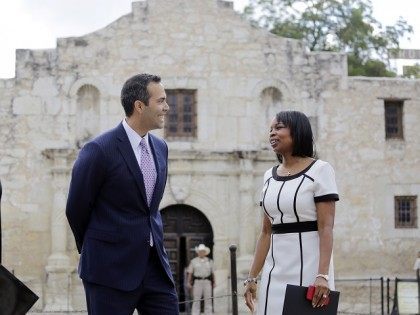 Texas Land Commissioner George P. Bush, left, talks with San Antonio Mayor Ivy Taylor before a news conference to celebrate the $31.5 million the General Land Office received for the preservation and development of the Alamo, Wednesday, Sept. 2, 2015, in San Antonio. (AP Photo/Eric Gay)