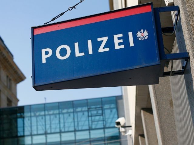 This picture taken in Vienna on September 6, 2012 shows a sign of the Polizei, Austria's Police department.