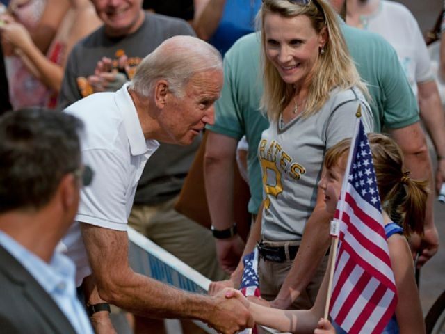 Vice President Joe Biden shakes hands with a girl during the annual Allegheny County Labor