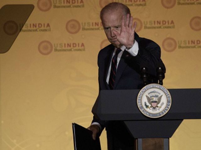 Joe R. Biden leaves after speaking during a reception for the US-India Strategic and Comme