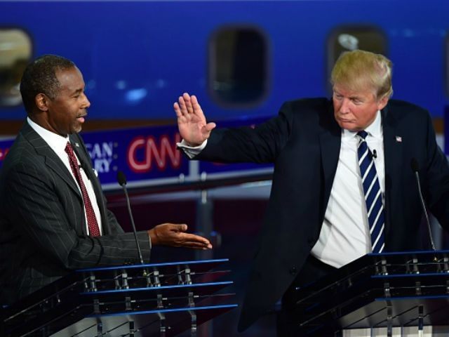Republican presidential hopefuls Ben Carson and Donald Trump participate in the Republican Presidential Debate at the Ronald Reagan Presidential Library in Simi Valley, California on September 16, 2015. Republican presidential frontrunner Donald Trump stepped into a campaign hornet's nest as his rivals collectively turned their sights on the billionaire in …