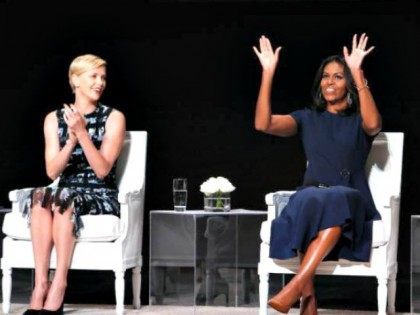 Charlize Theron and Michelle Obama AP