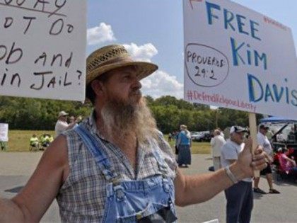 Coleman Colston of Henry County, Ky., joins in the protest in support of jailed Rowan county cerk Kim Davis at the Carter County Detention Center in Grayson, Ky., Tuesday, Sept. 8, 2015. After five days behind bars, Davis was ordered released from jail Tuesday by the judge who locked her …