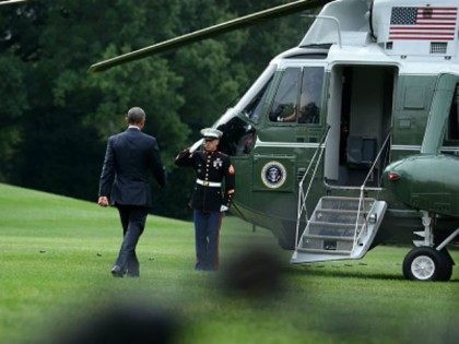 U.S. President Barack Obama walks towards the Marine One prior to his departure from the White House August 31, 2015 in Washington, DC. President Obama is travelling to Anchorage, Alaska to address the Global Leadership in the Arctic: Cooperation, Innovation, Engagement and Resilience (GLACIER) Conference. (Photo by