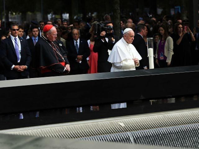 Pope Francis pauses during a visit to Ground Zero on September 25, 2015 in New York City. Francis visited Ground Zero following his address at the United Nations. The interfaith prayer service will include Muslims, Jews, Christians, Sikhs and Hindus. The Pope will also meet with family members of victims …