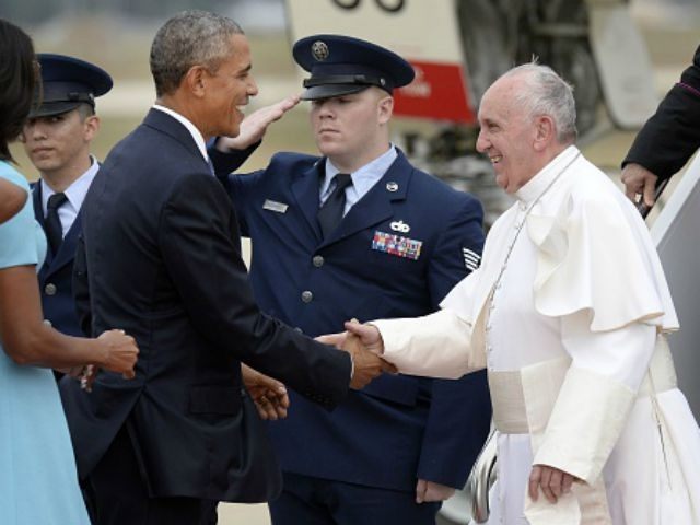 Pope Francis (R) is greeted by U.S. President Barack Obama, first lady Michelle Obama and other political and Catholic church leaders after arriving from Cuba September 22, 2015 at Joint Base Andrews, Maryland. Francis will be visiting Washington, New York City and Philadelphia during his first trip to the United …