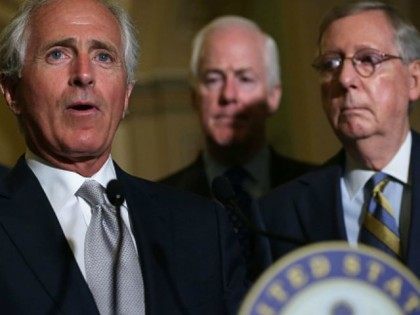 U.S. Sen. Bob Corker (R-TN) (2nd L) speaks to members of the media as (L-R) Sen. John Thune (R-SD), Senate Majority Whip Sen. John Cornyn (R-TX) and Senate Majority Leader Sen. Mitch McConnell (R-KY) listen after the weekly Senate Republican Policy Luncheon at the Capitol September 9, 2015 in Washington, …