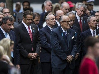 New Jersey Gov. Chris Christie, New York Gov. Andrew Cuomo, Commissioner of the New York Police Department Bill Bratton, former New York City Mayor Rudy Giuliani, U.S. Sen. Chuck Schumer (D-NY), New York City Mayor Bill de Blasio and former New York City Mayor Michael Bloomberg pause for a moment …