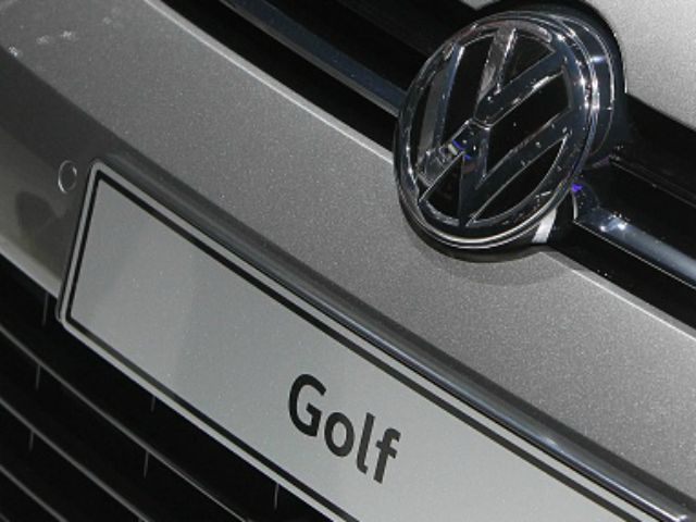 German car maker Volkswagen is pictured on a Golf model at the 66th IAA auto show in Frankfurt am Main, western Germany, on September 22, 2015. German auto giant Volkswagen revealed that 11 million of its diesel cars worldwide are equipped with devices that can cheat pollution tests, a dramatic …