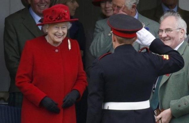 Britain's Queen Elizabeth presents a prize at the annual Braemar Highland Gathering in Braemar, Sco