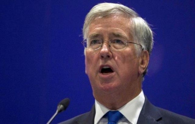 Britain's Secretary of Defence Michael Fallon delivers a speech at the Defence and Securit