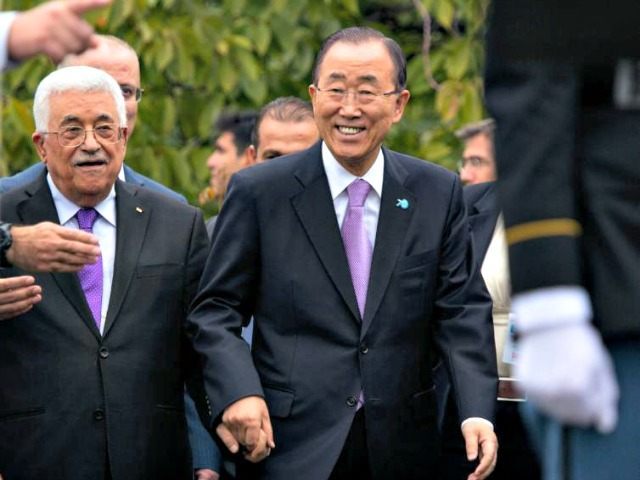 Ban Ki Moon holds hands with Abbas Craig RuttleAP
