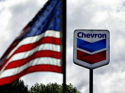 Chevron Sign and Flag Elaine ThompsonAP