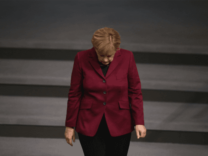 merkel hits record poll low