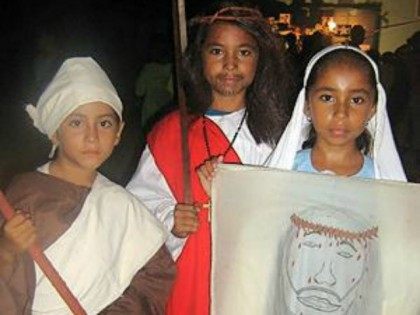 three Belizean children from San Pedro Town dressed as Christian saints, martyrs and Biblical figures for the observance of Allhallowtide. It is common for Christian schools to host parties on the first two days of this triduum, All Hallows' Eve (Halloween) and All Hallows' Day (All Saints' Day), in which …