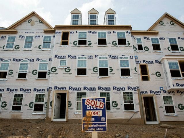 : New townhouses are under construction June 23, 2015 in Northeast Washington, DC. Purchas