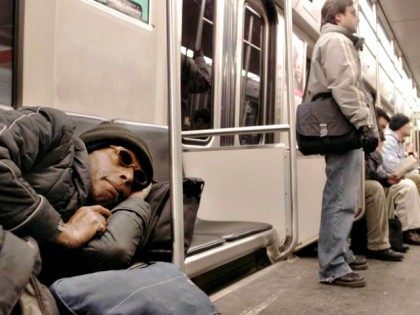 Homeless Man Sleeps on Subway AP