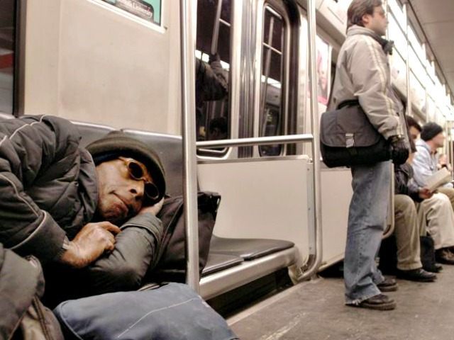 Homeless Man Sleeps on Subway AP