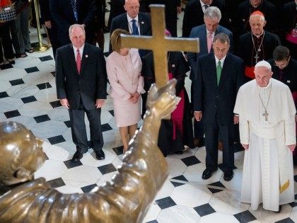 Junipero Serra Statue and Pope (Michael Reynolds / Associated Press)
