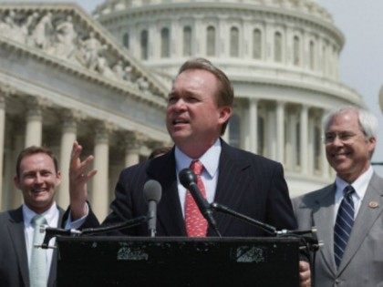 Rep. Mick Mulvaney (R-SC) (C) speaks during a news conference with a bipartisan group of H