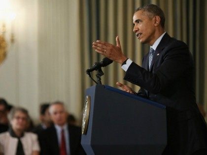 President Barack Obama holds a news conference in the State Dining Room at the White House