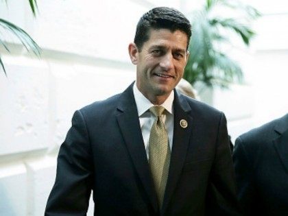 Rep. Paul Ryan (R-WI) (L) leaves with Rep. Luke Messer (R-IN) after a House Republican Conference meeting October 21, 2015 at the Capitol in Washington, DC. Rep. Ryan said he is open to running for Speaker of the House if the GOP will unify behind him.