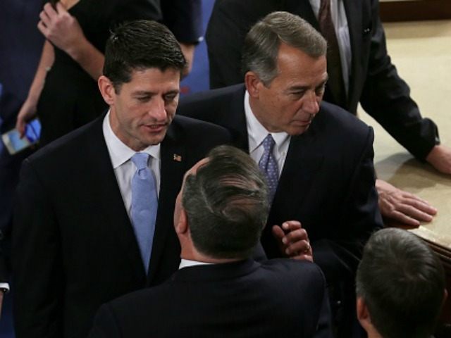 Newly-elected Speaker of the House Paul Ryan (R-WI) stands with Outgoing Speaker of the Ho