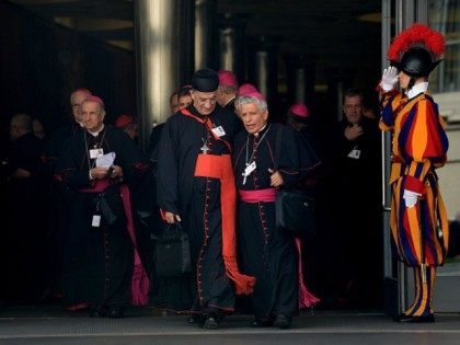 Bishops and cardinals leave at the end of the morning session of the Synod on the Family,