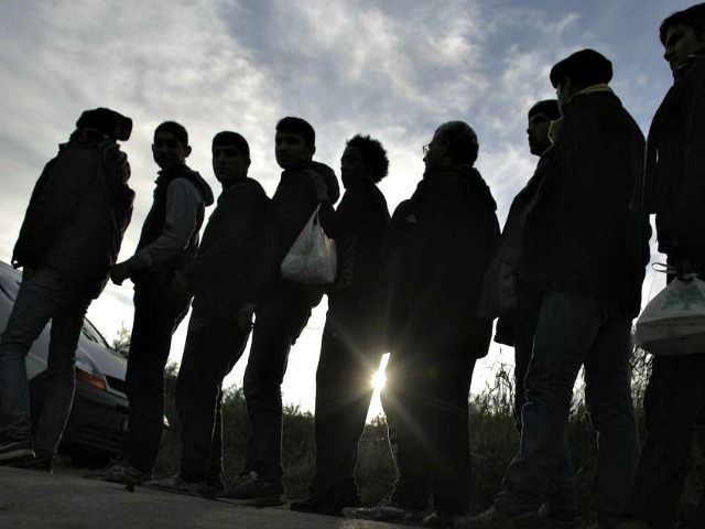 Calais Migrants Line Up AP PhotoMarkus Schreiber