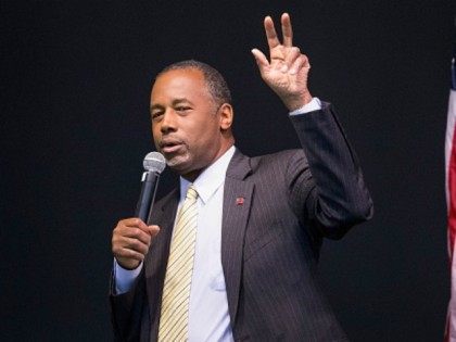 Republican presidential candidate Ben Carson speaks to guests at a barbeque hosted by Jeff