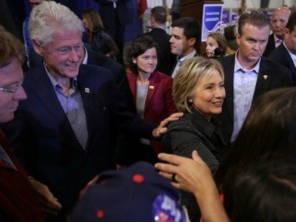 Democratic presidential candidate Hillary Clinton and her husband and former President Bill Clinton greet Iowans during the Central Iowa Democrats fall barbecue November 15, 2015 at Hansen Agriculture Student Learning Center of Iowa State University in Ames, Iowa. Clinton continued to campaign for the nomination from the Democratic Party. (Photo …