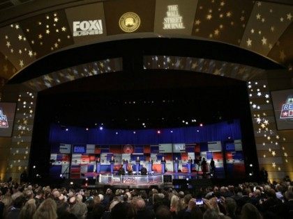 John Kasich, Jeb Bush, Marco Rubio, Donald Trump, Ben Carson, Ted Cruz, Carly Fiorina and Rand Paul stand on stage during the Republican Presidential Debate hosted by Fox Business and The Wall Street Journal November 10, 2015 in Milwaukee, Wisconsin.AFP PHOTO / JOSHUA LOTT (Photo credit should read