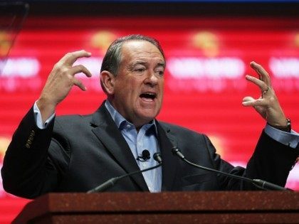 Republican presidential candidate former Arkansas Governor Mike Huckabee speaks during the Sunshine Summit conference being held at the Rosen Shingle Creek on November 13, 2015 in Orlando, Florida. The summit brought Republican presidential candidates in front of the Republican voters. (Photo by