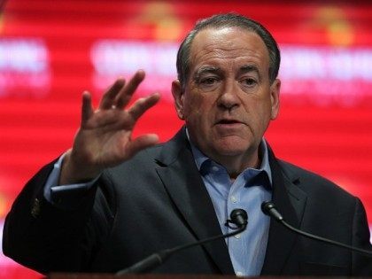 Republican presidential candidate former Arkansas Governor Mike Huckabee speaks during the Sunshine Summit conference being held at the Rosen Shingle Creek on November 13, 2015 in Orlando, Florida. The summit brought Republican presidential candidates in front of the Republican voters. (Photo by )