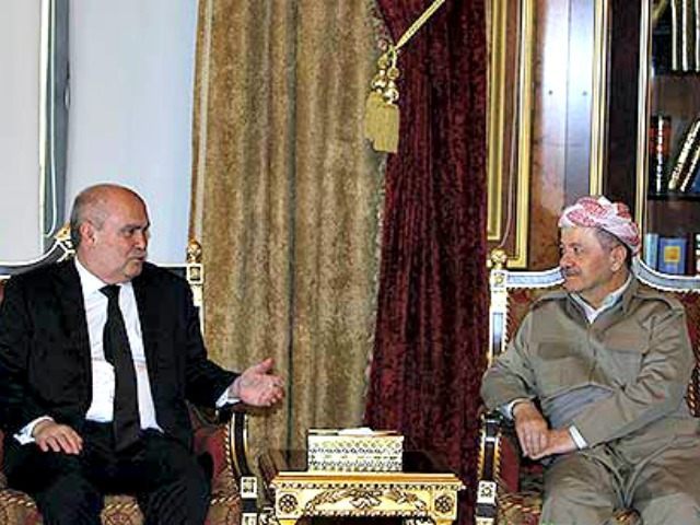 Iraqi Kurdish Regional President Massoud Barzani (R) meets with Turkish Foreign Minister F