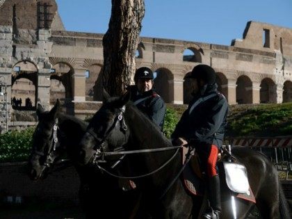 Mounted police patrol near the Arch of Constantine on November 25, 2015 in Rome. Italy is to spend an additional one billion euros ($1.06 billion) on security, Italian Prime Minister Matteo Renzi announced today. In a speech at Rome city hall, he said 500 million euros would be earmarked for …