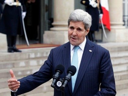 US Secretary of State John Kerry talks to the media after a meeting with French President Francois Hollande at the Elysee Presidential Palace on November 17, 2015 in Paris, France. John Kerry arrives in Paris to pay tribute to victims of last week's terrorist attacks. (Photo by