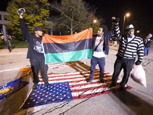 Milwaukee-Flag-PROTEST-BLM-Twitter-VDCPhotoNews.jpg