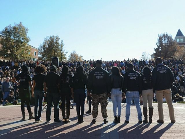 Members of the Concerned Student 1950 movement speak to the crowd of students on the campus of University of Missouri - Columbia on November 9, 2015 in Columbia, Missouri. Students celebrate the resignation of University of Missouri System President Tim Wolfe amid allegations of racism. (Photo by