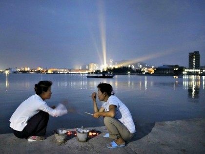 N Korean Women on Shore Wong Maye-E Associated Press