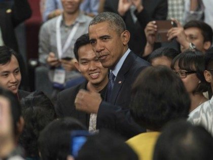 Barack Obama arrives during a town hall with Young Southeast Asia Leaders Initiative (YSEA