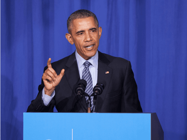 U.S. President Barack Obama makes remarks at an Organizing for Action dinner on November 9