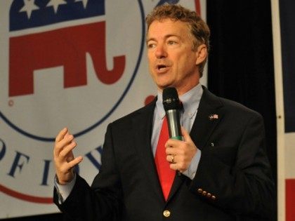 : Republican presidential candidate Sen. Rand Paul (R-KY) (L) speaks at the Growth and Opportunity Party, at the Iowa State Fair in Des Moines, Iowa, Saturday October 31, 2015. With just 93 days before the Iowa caucuses Republican hopefuls are trying to shore up support amongst the party. (Photo by