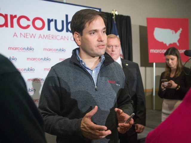 Republican presidential candidate Sen. Marco Rubio (R-FL) greets guests during a town hall